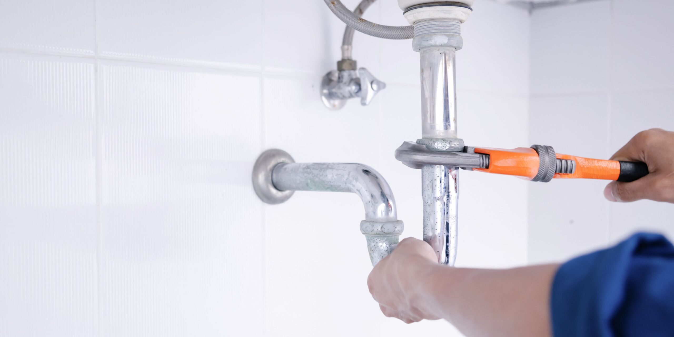 fps-plumbing-basin-installation-supply-lines Plumber installing basin supply lines and fittings